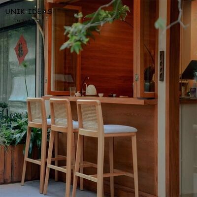 Harga yang bagus Nordic Modern Coffee Shop Front Counter High bar Stool Garden Courtyard Creative Solid Wood Hand Made Rattan bar Chair on line