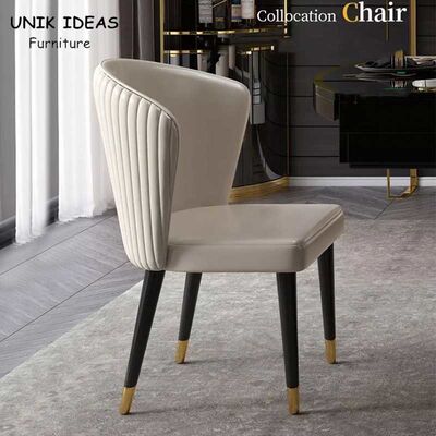 Harga yang bagus 84cm Modern Minimalist Kitchen Table And Chairs Set Metal Leather Hotel Lobby on line